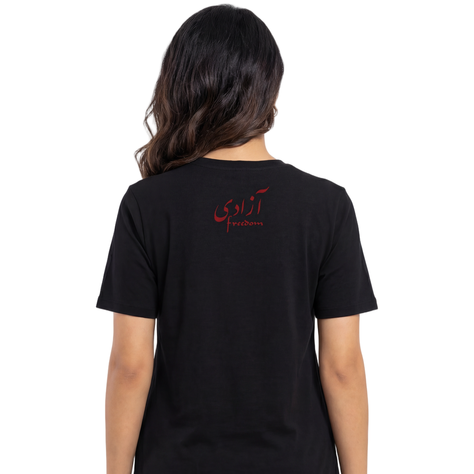 Person wearing a black t-shirt with red text on the back, standing against a white background