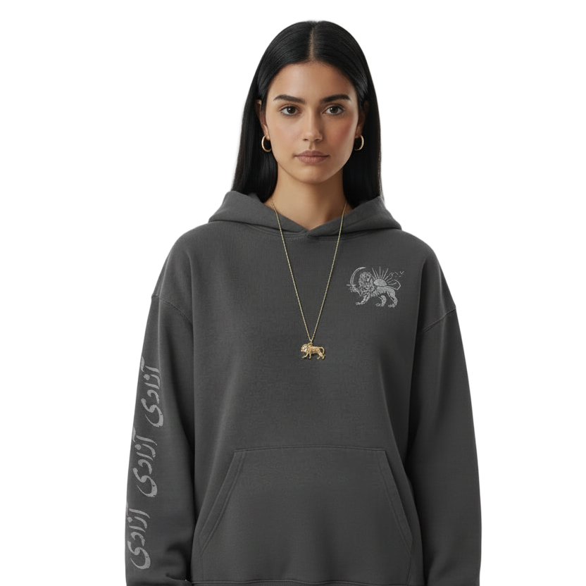 Person wearing a dark gray hoodie with text and graphics on a white background