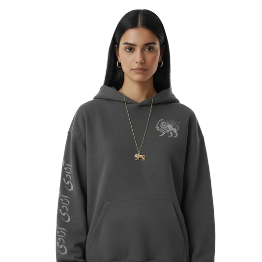 Person wearing a dark gray hoodie with text and graphics on a white background